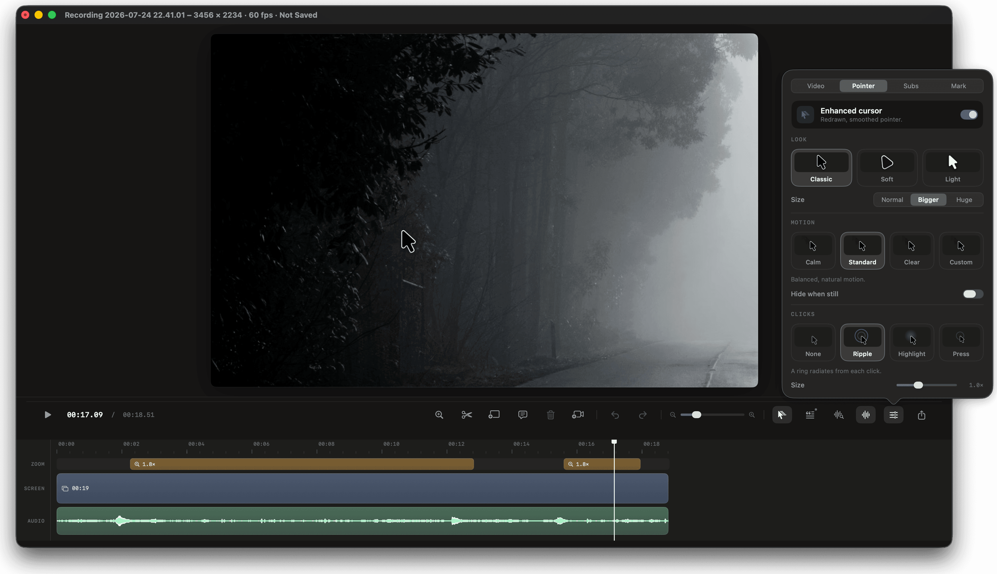 The SlateCut editor: a screen recording playing back, the Pointer inspector open beside it with cursor look, motion and click-effect settings, and the timeline below showing zoom, screen and audio lanes with two 1.8× zoom bands